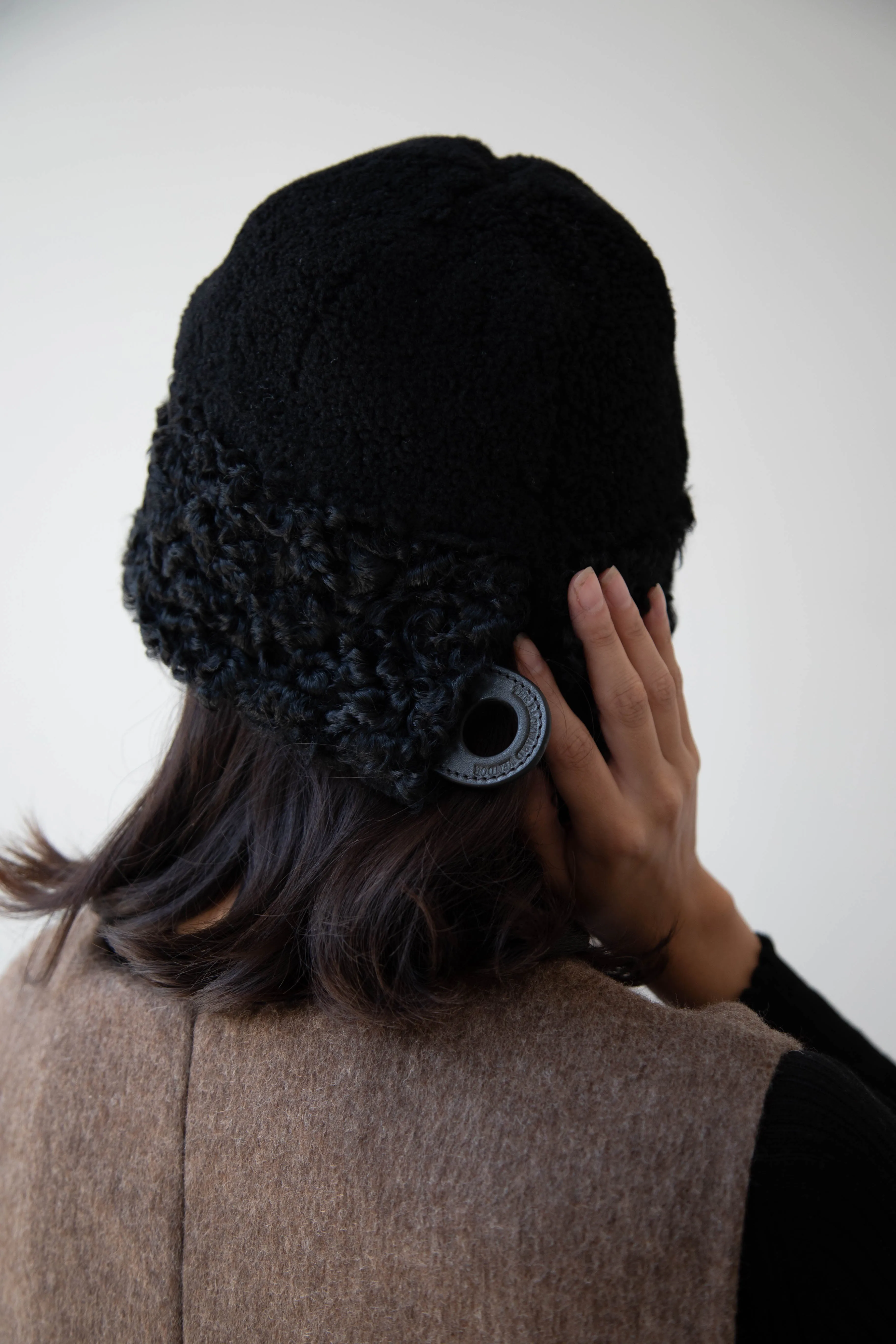 The Backward Vendor | Herd Hat in Black Shearling