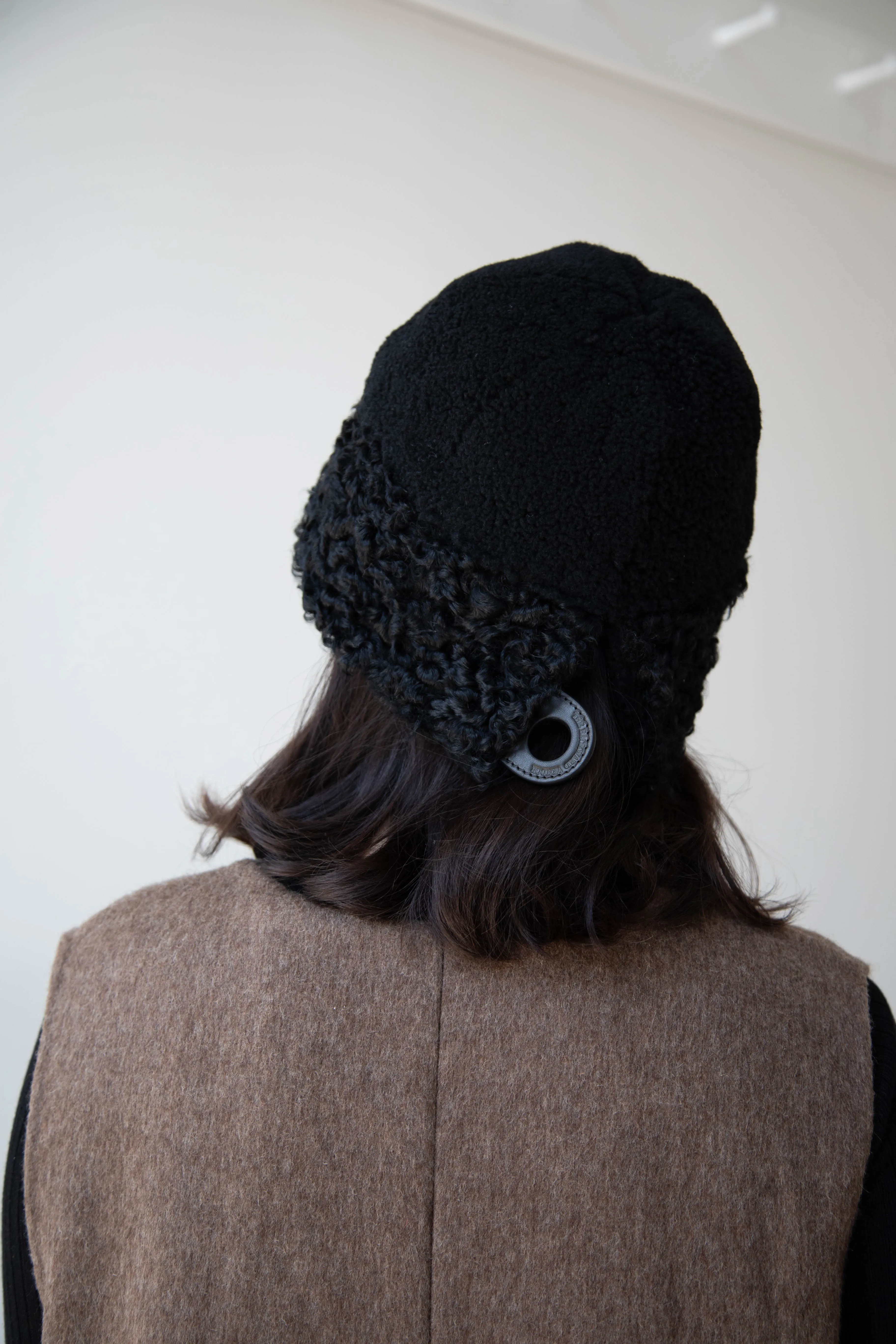 The Backward Vendor | Herd Hat in Black Shearling