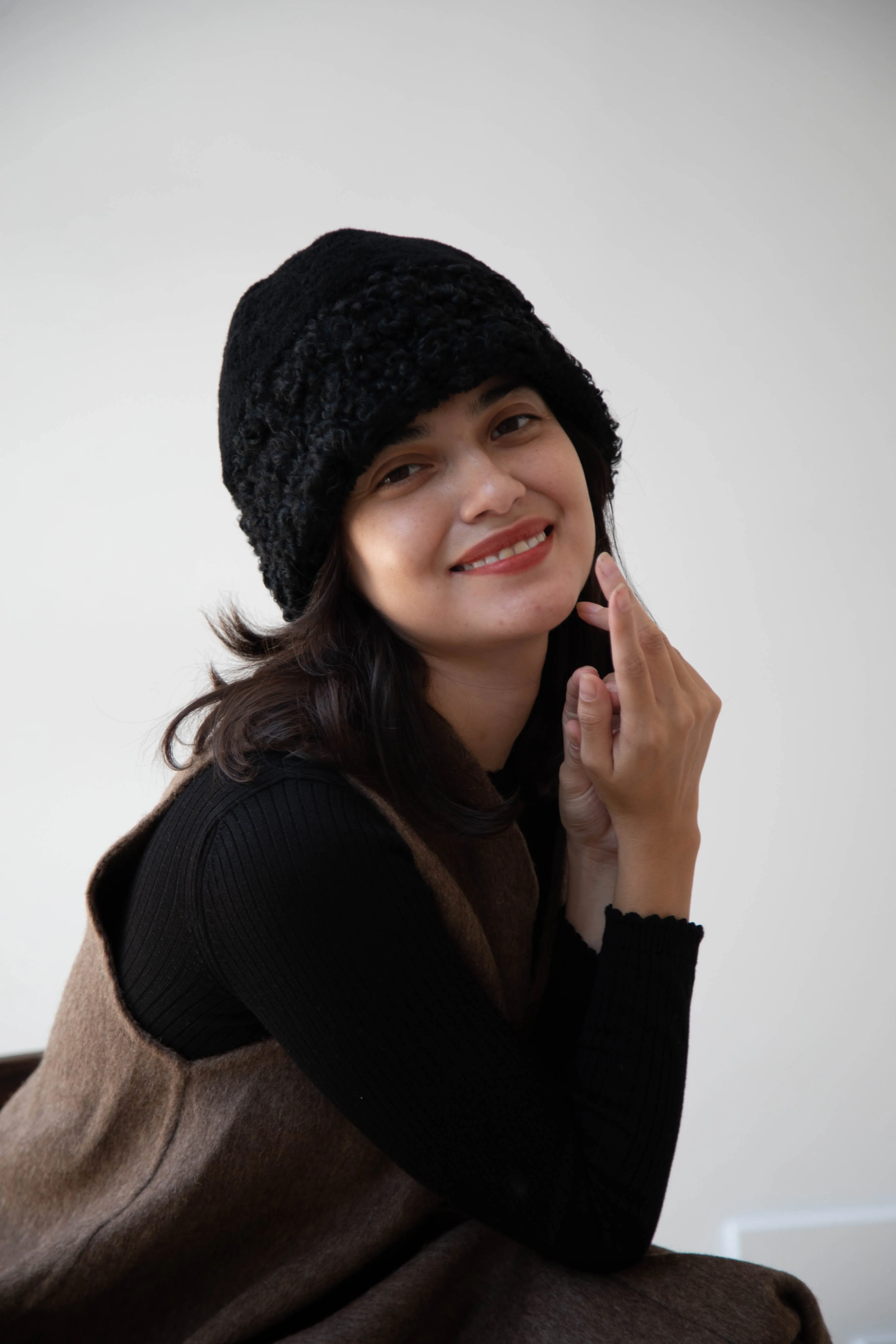 The Backward Vendor | Herd Hat in Black Shearling