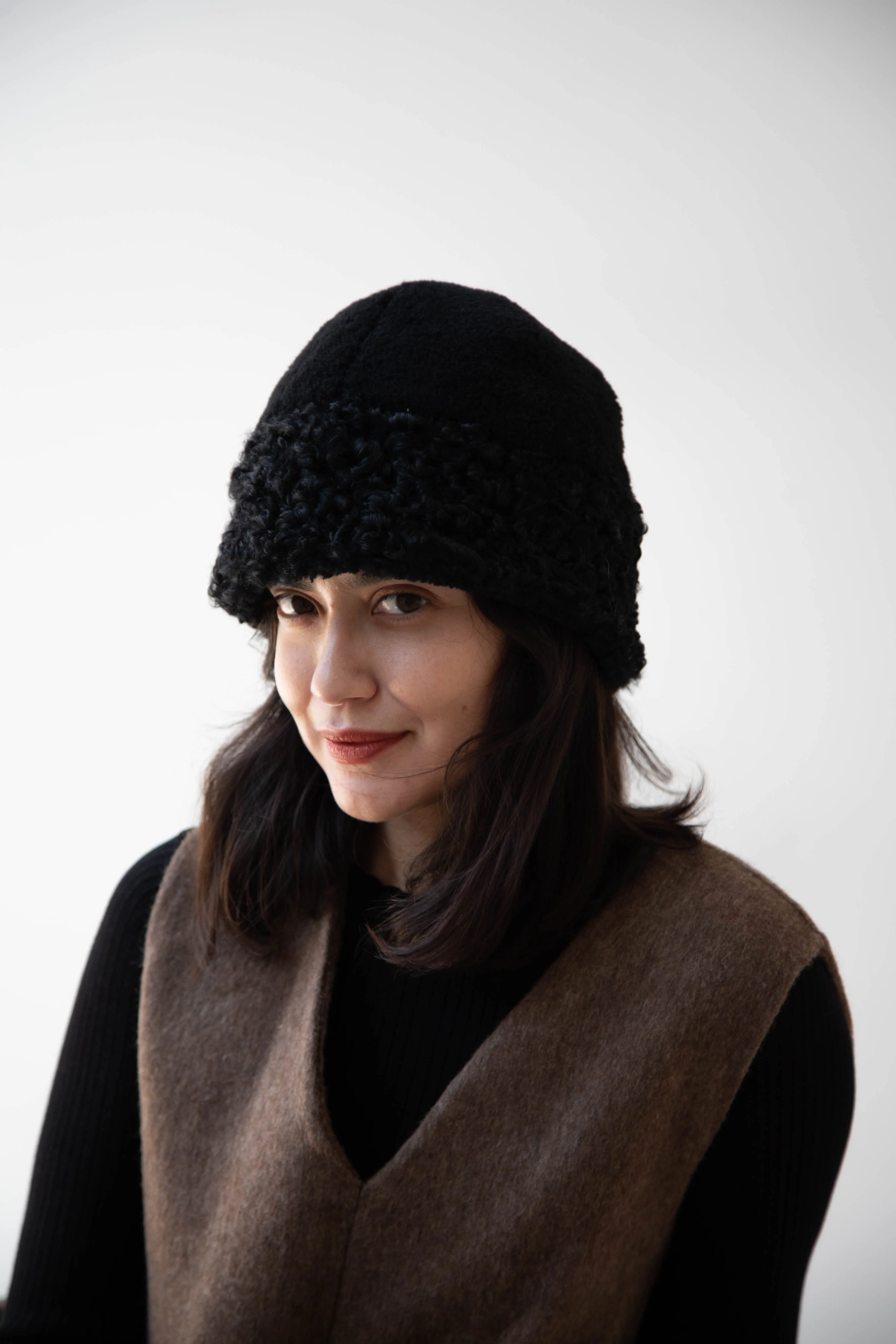 The Backward Vendor | Herd Hat in Black Shearling