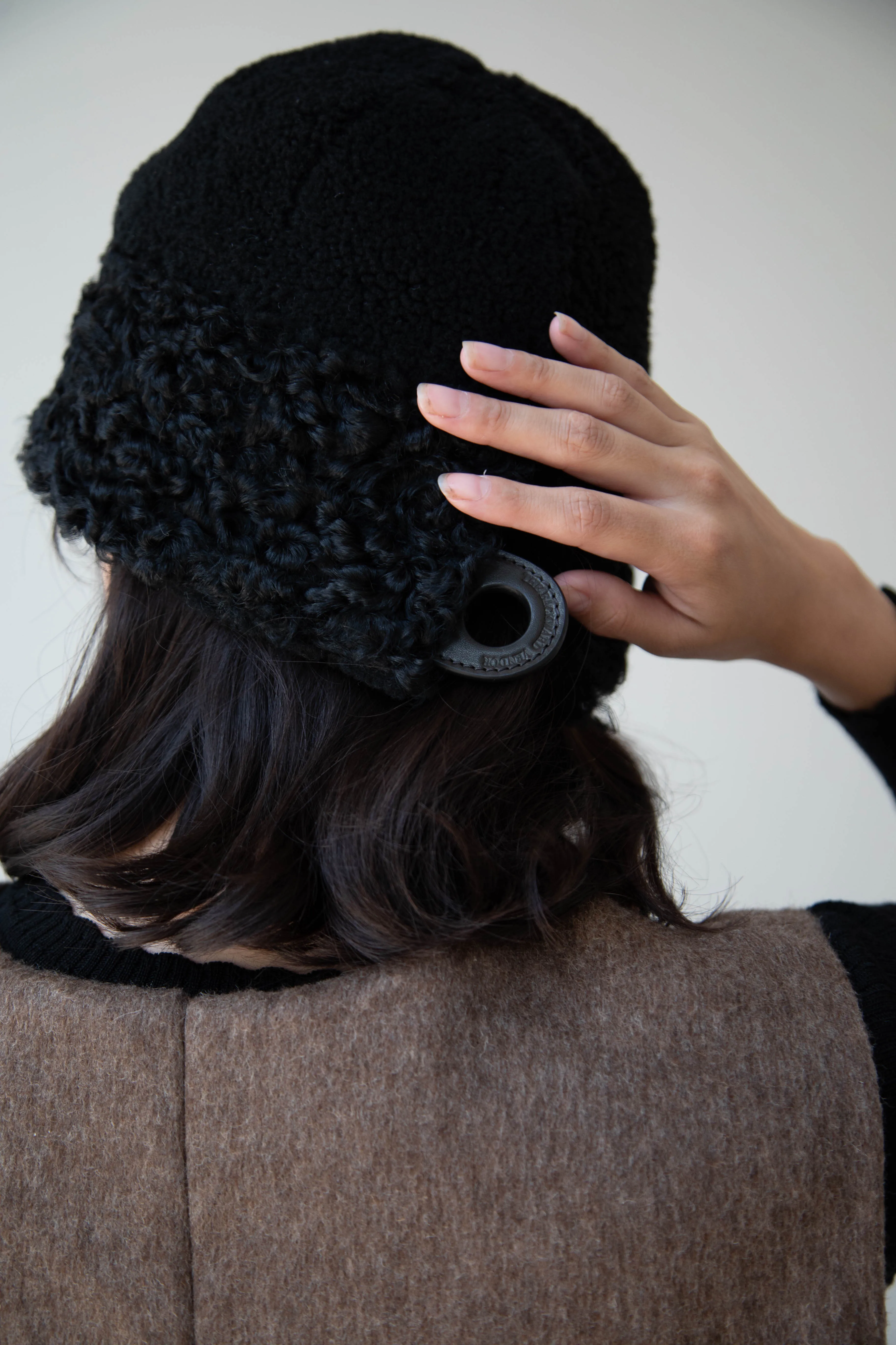 The Backward Vendor | Herd Hat in Black Shearling